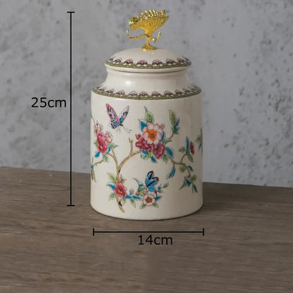 Cream-colored ceramic storage jar with delicate floral motifs and gold decorbites dragonfly lid for bedroom decor