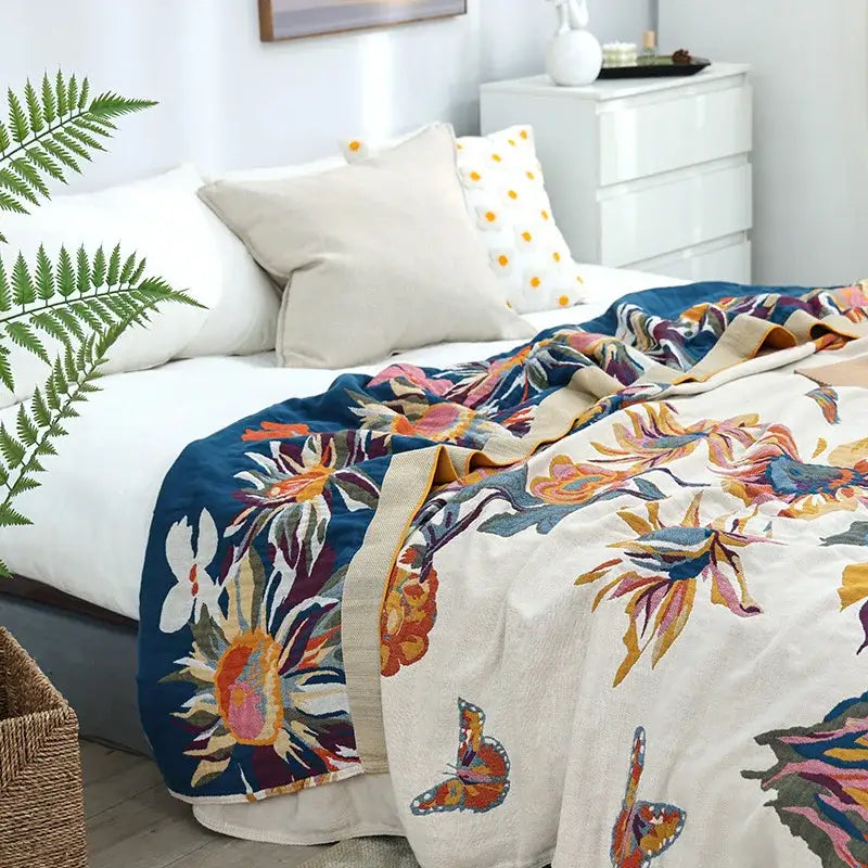 Floral cotton summer blanket and pillow set featuring a vibrant floral and butterfly decorbites cotton summer design