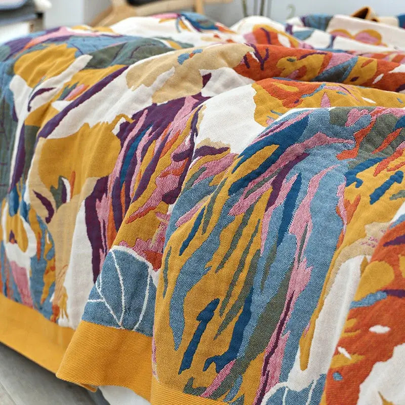 Vibrant abstract floral-patterned decorbites cotton summer blanket and pillow set in mustard yellow teal blue and soft pink hues