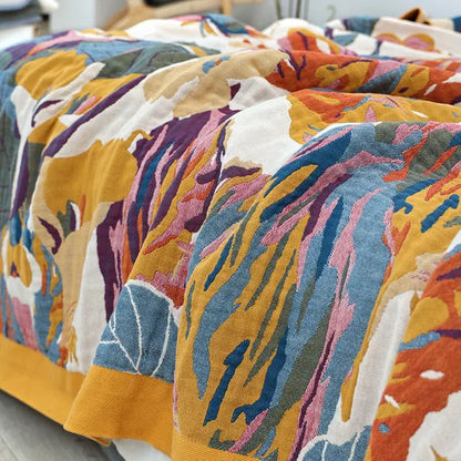 Vibrant abstract floral-patterned decorbites cotton summer blanket and pillow set in mustard yellow teal blue and soft pink hues