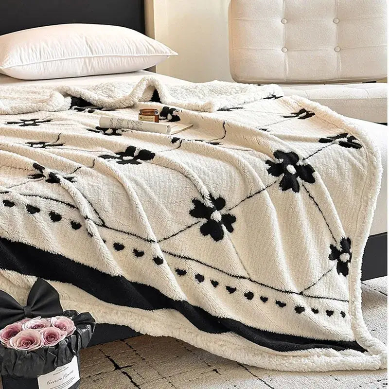 Cream-colored plush jacquard lamb wool blanket with black floral and heart embroidery for living room throw