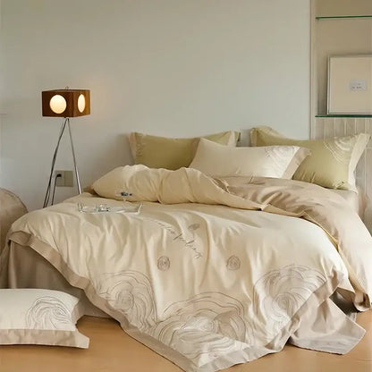 Cream-colored satin duvet cover set with delicate gray floral embroidery for elegant bedroom decor