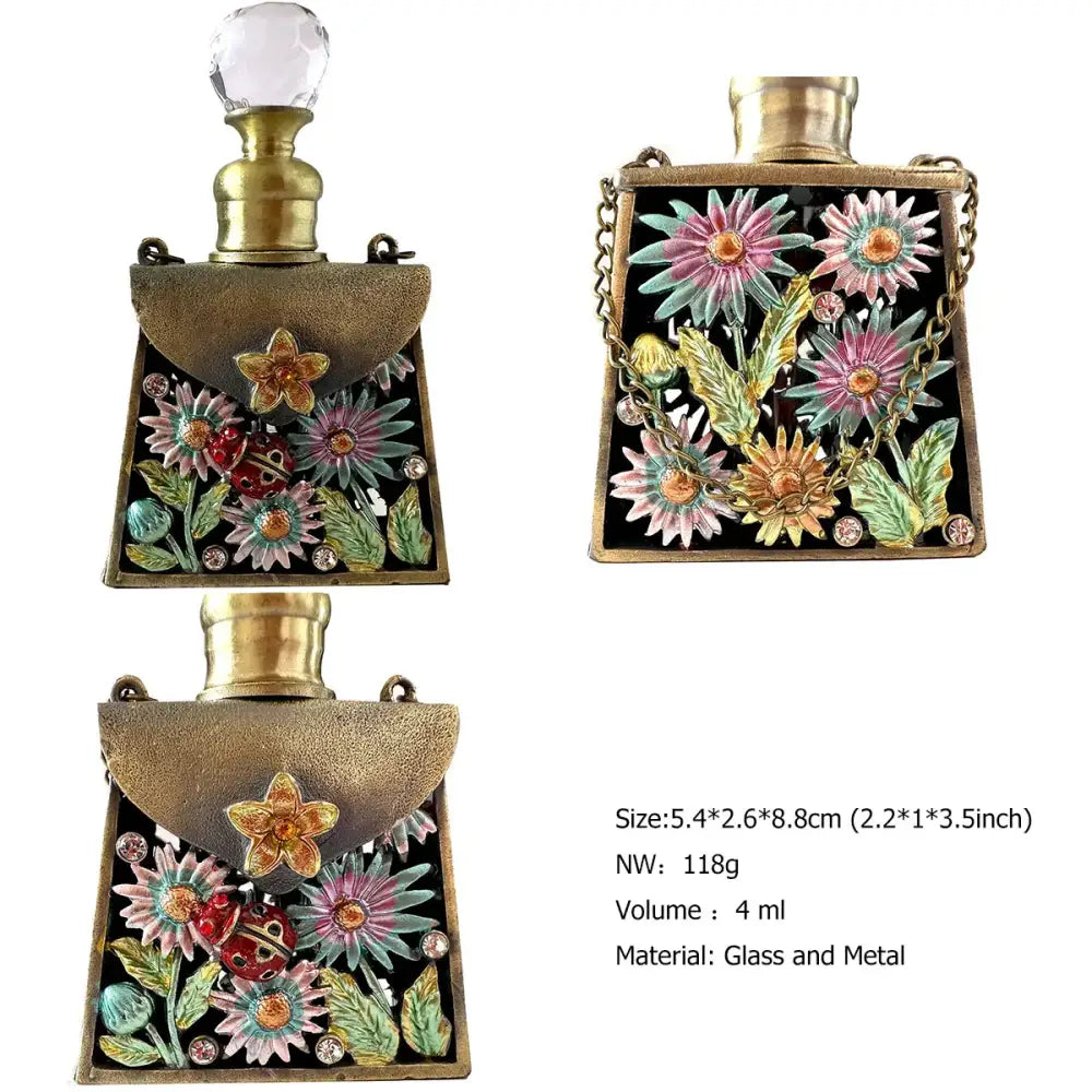 A brass-colored metal enamel perfume bottle with colorful floral designs and a clear crystal stopper for bedroom decor