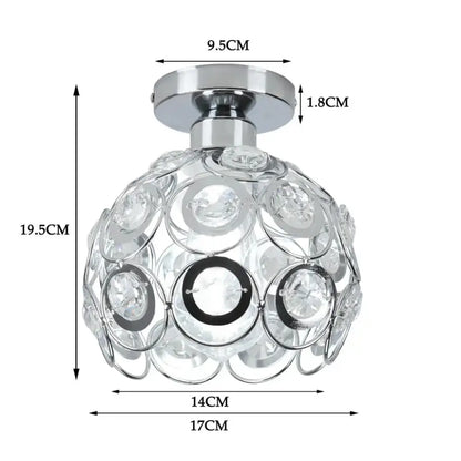 A chrome-finished crystal led ceiling chandelier with clear faceted crystals in overlapping circular patterns