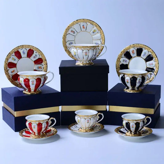 Elegant porcelain tea cup saucer set in red black and white with floral gold trim for dining room drinkware