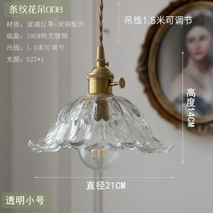 Floral green and champagne glass pendant light with fluted petal design and brass hardware for dining room use