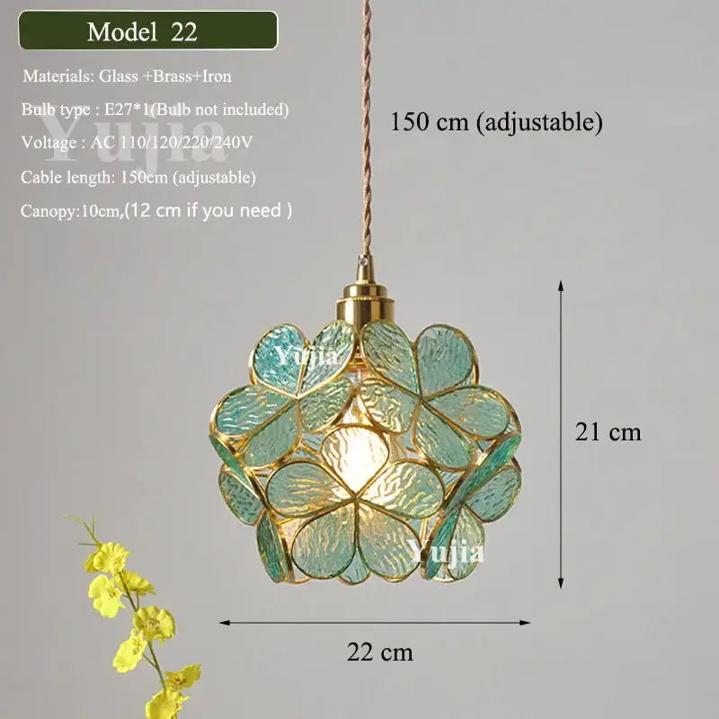 Floral green glass and brass pendant light with teal glass shade and iron accents designed in a floral pattern