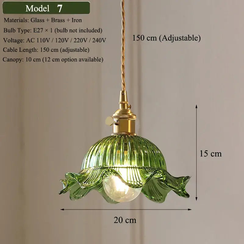 Floral green glass pendant light with ribbed green glass shade and brass hardware for kitchen lighting