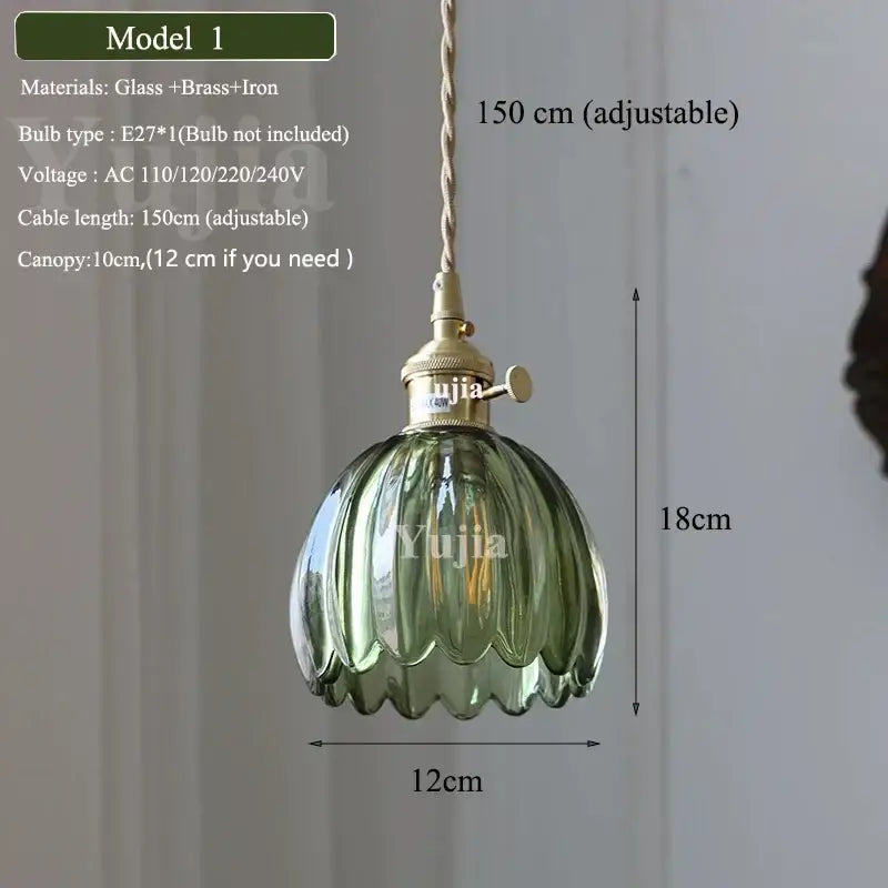 Floral green glass and brass pendant light with ribbed green glass shade and adjustable cord for kitchen use