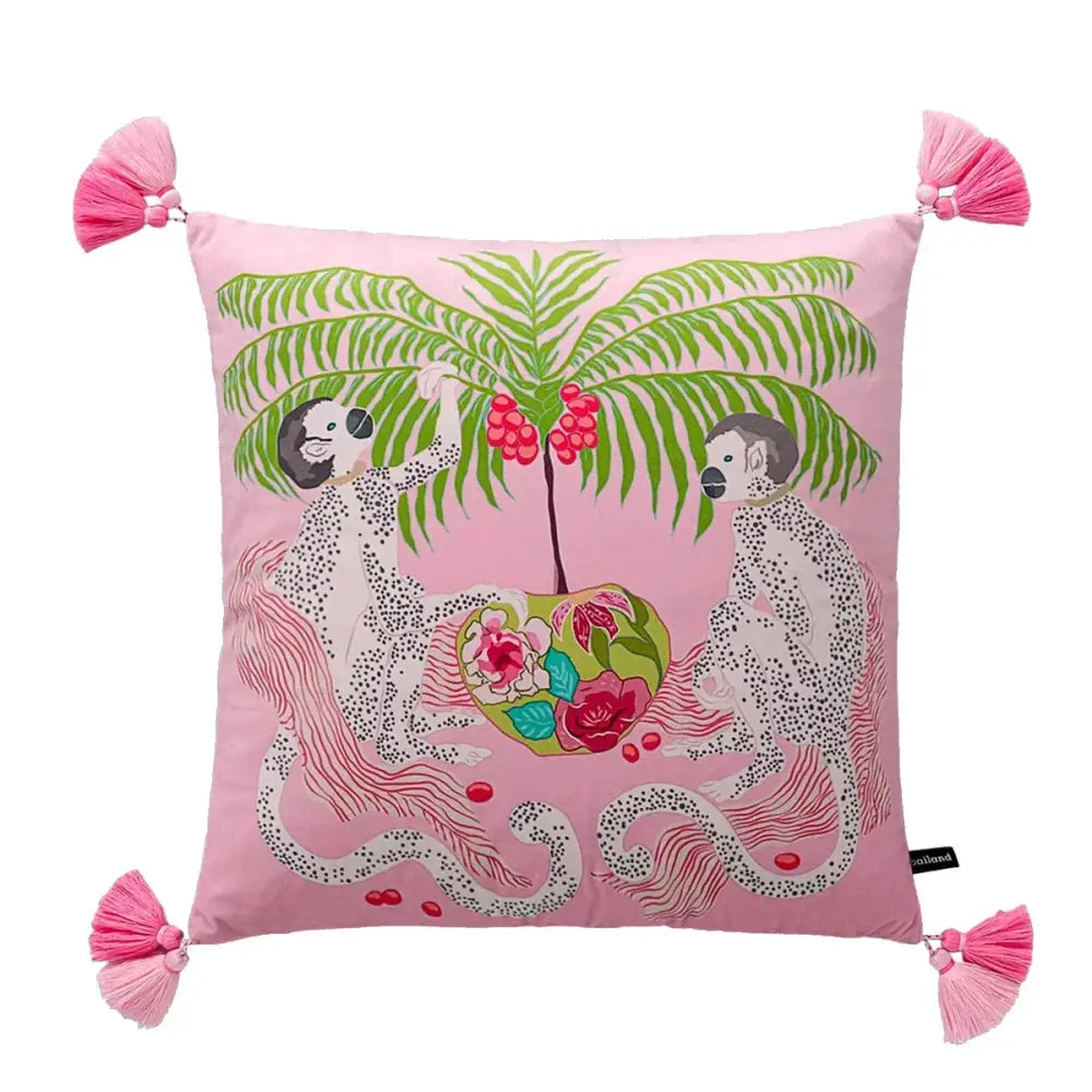 Pink handmade lumbar pillow case with vibrant spotted monkeys under palm tree and pink tassels for bedroom decorbites decor