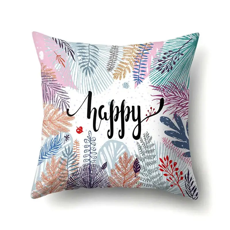 Colorful pillow cover with decorbites green tropical leaves and happy script for vibrant bedroom decor
