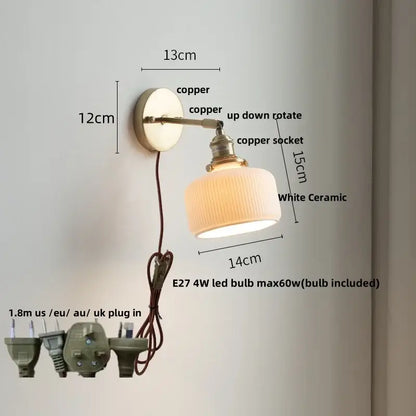 Copper-finished wall light fixture with white ceramic ribbed lampshade and adjustable arm for bedroom use