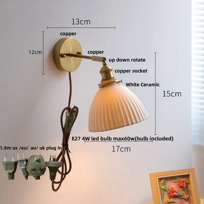Vintage-style wall light fixture with brass copper arm and white ceramic ridged lampshade for bedroom use