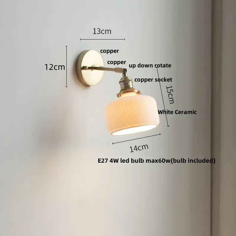 A vintage-style wall light fixture with copper arm and white ceramic ridged lampshade for bedroom use