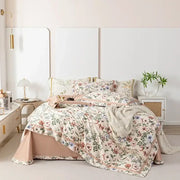 Floral pastel 100s egyptian cotton bedding set with soft pastel floral pattern and blush pink trim on cream base fabric