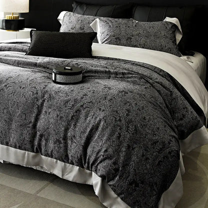 Black and gray damask-patterned duvet set with white satin trim in floral pastel cream lyocell cotton bedding set