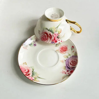Floral pattern porcelain coffee cup and saucer set with delicate white porcelain and decorbites flowers pattern accents