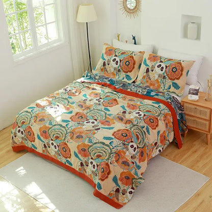 Beige cotton gauze towel blanket with vibrant floral and panda pattern accented by orange trim for decorbites bedroom use