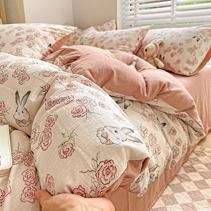 Floral pink and cream comforter set with cotton flower printed design and embroidered bunny faces for bedroom decorbites cotton flower