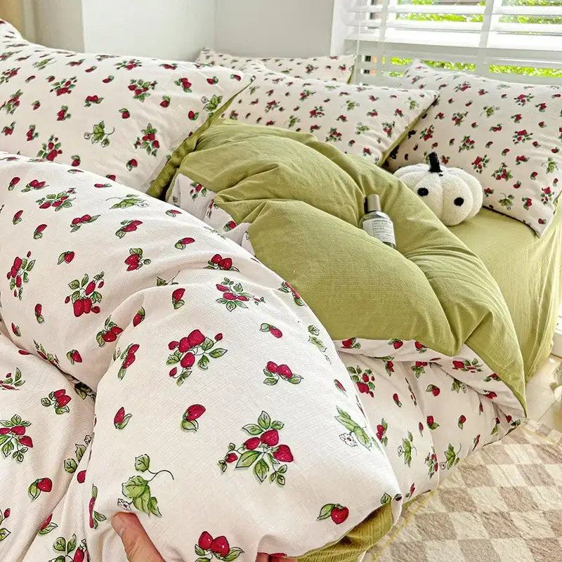 White duvet cover with red strawberry green leaf prints paired with olive green comforter from decorbites cotton flower printed comforter set