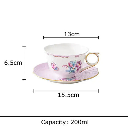 Floral pink and purple porcelain coffee mug set with gold trim featuring intricate floral and butterfly motifs