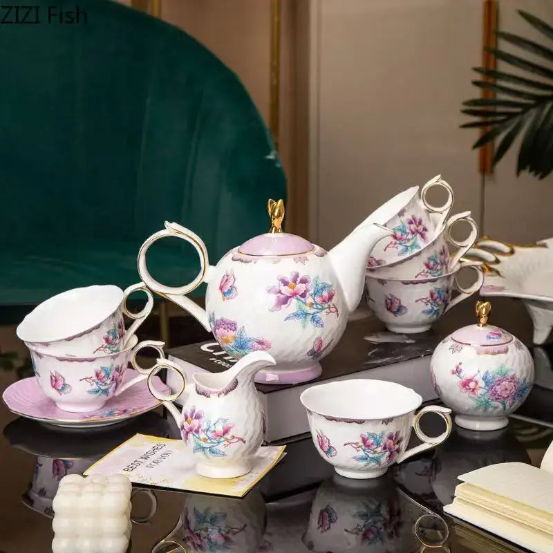Elegant floral pink and purple porcelain coffee mug set with gold trim featuring delicate floral patterns and gold handles