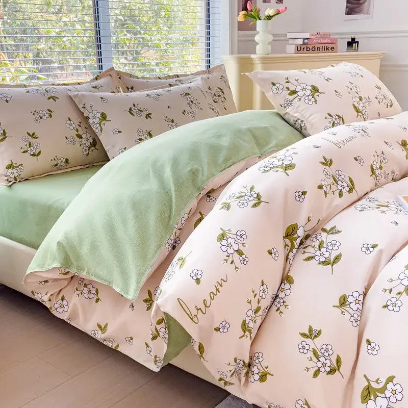 Pastel pink and mint green floral puppy cotton printed bedding set with delicate blossoms and gold dream script on duvet cover