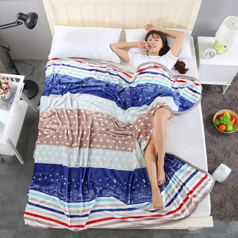 A cozy coral fleece flannel blanket with blue red beige stripes star patterns and cityscape for bedroom decorbites decor