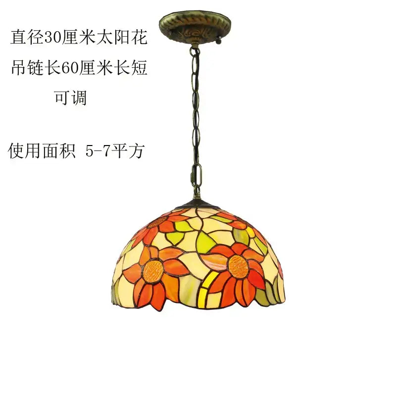 A vibrant sunflower floral stained glass baroque tiffany pendant light with brass chain for dining room decorbites baroque tiffany