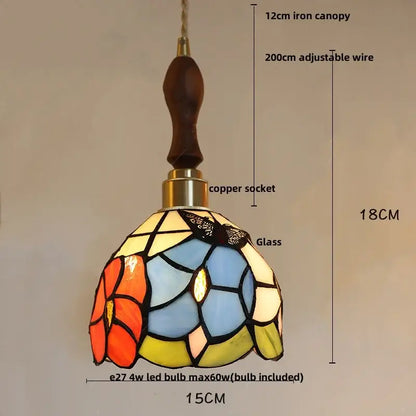 A vibrant floral stained glass pendant light with orange blue and yellow hues for decorbites colorful glass led use