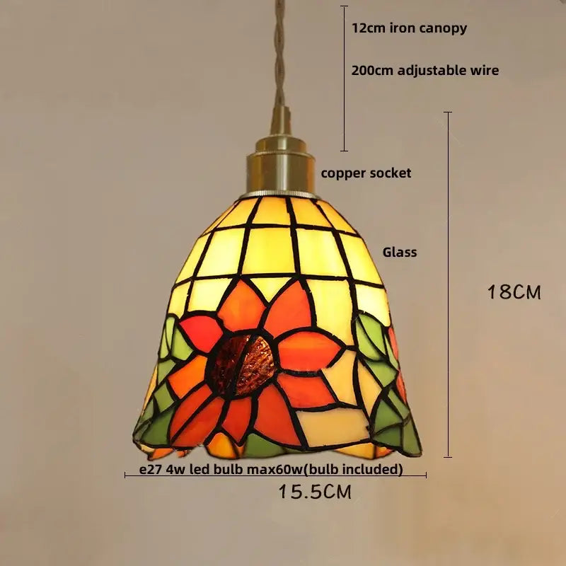 A vibrant pendant light with sunflower design in orange yellow and green leaded glass decorbites colorful glass led