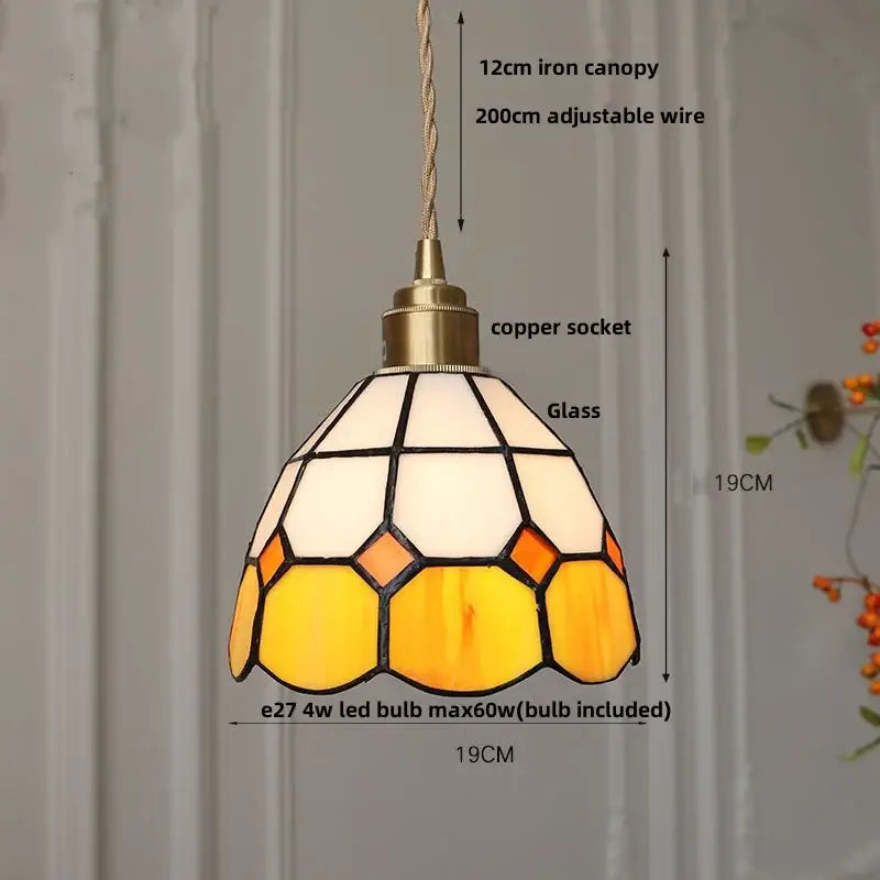 A warm-toned floral stained glass pendant light with honeycomb cream amber panels for dining room decorbites colorful glass led
