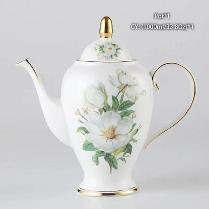 A white porcelain teapot with hand-painted magnolia blossoms and gold trim from decorbites camellia bone china set