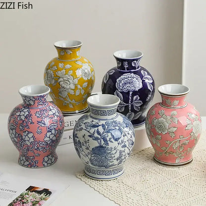 Set of five vibrant ceramic vases featuring floral and geometric patterns in white porcelain for living room decor