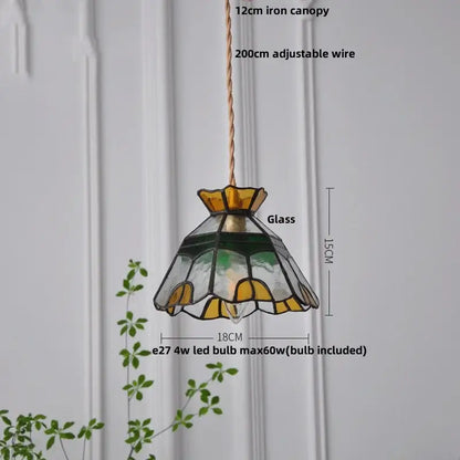 Stained glass brass pendant lamp with floral yellow and green patterns and 12cm iron canopy by decorbites glass brass