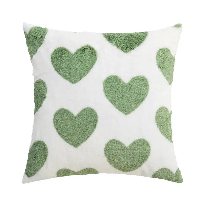 White throw pillow cover with soft fuzzy sage green heart patterns from decorbites fluffy comfort pillow collection