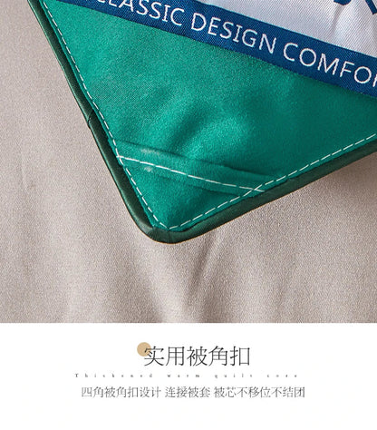 Green quilted bed corner protector with reinforced stitching and blue ribbon trim for fluffy quilt code comforter