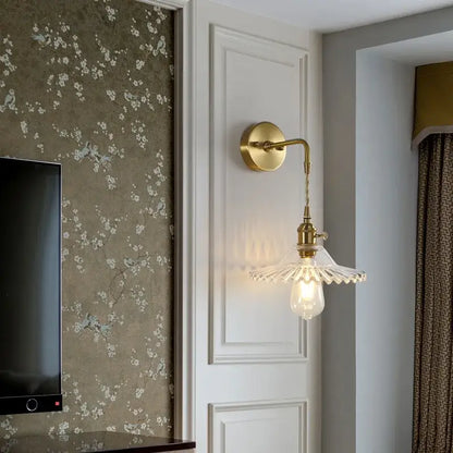 Fluted brass glass led wall sconce with clear fluted glass shade and exposed bulb for bedroom decorbites brass glass