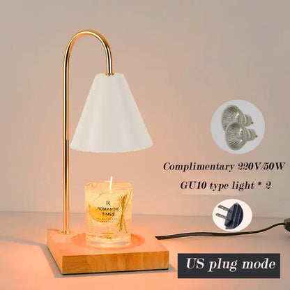 Gold-toned metal candle warmer with white conical shade and wooden base for decorbites gold wax melting use