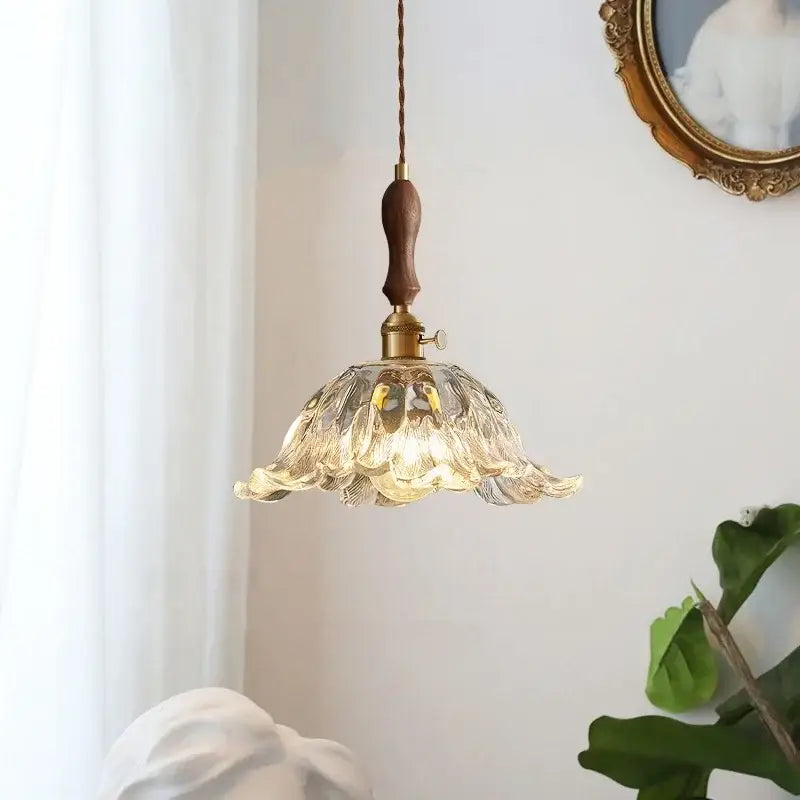 Fluted glass led pendant lamp with translucent petals and brass accents for elegant dining room lighting