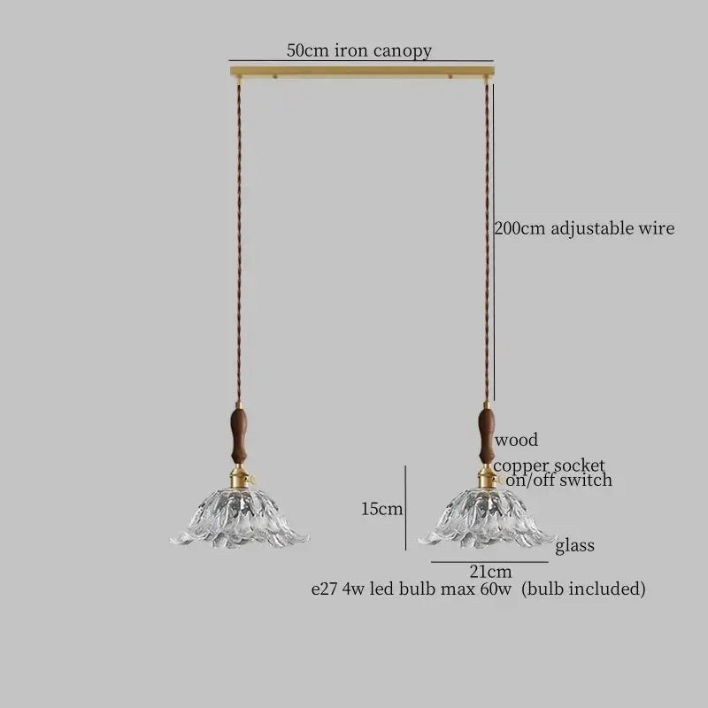 A delicate clear glass led pendant lamp with fluted design and wooden accents for dining room lighting