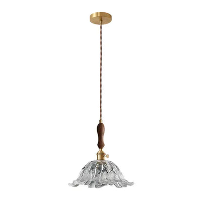 Fluted glass led pendant lamp with brass accents and clear petal design ideal as a pendant lamp for dining room