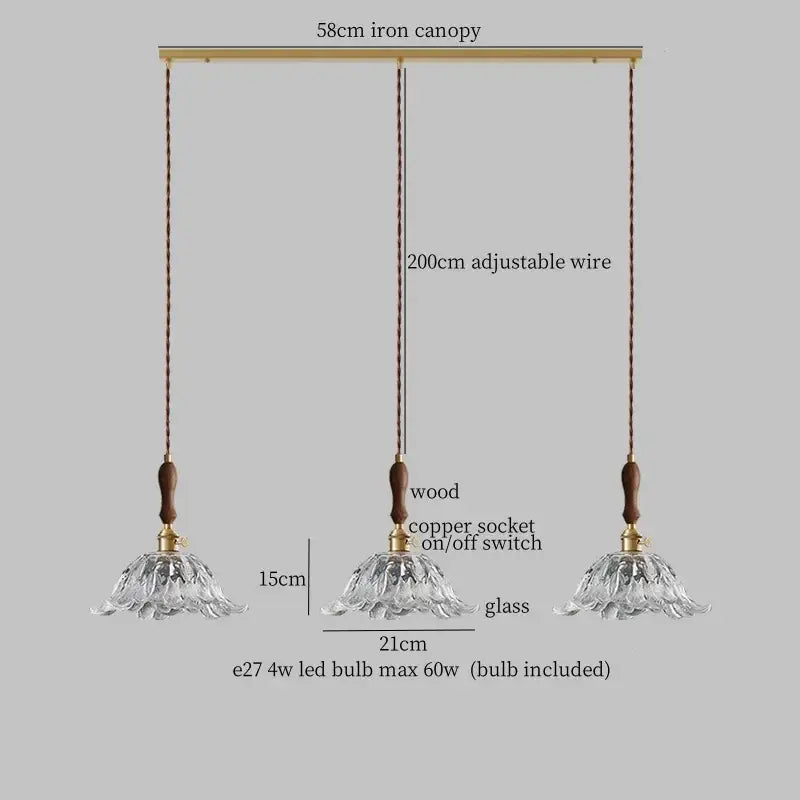Fluted glass led pendant lamp with three clear flower petal shades brass iron canopy copper sockets and wooden accents