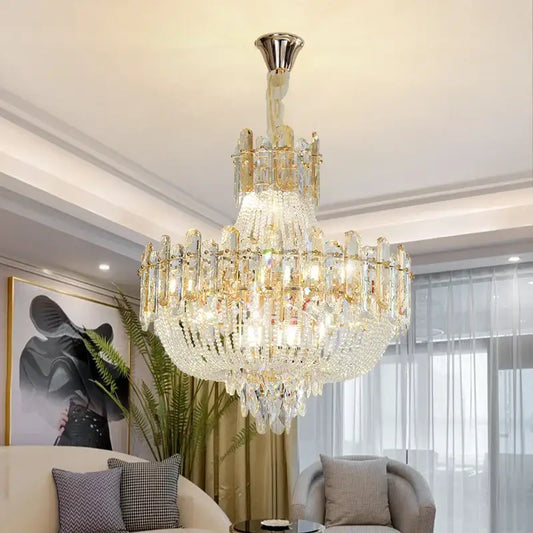 A multi-tiered french bead chain crystal chandelier with gold tone accents and polished chrome mount for dining room decorbites french bead