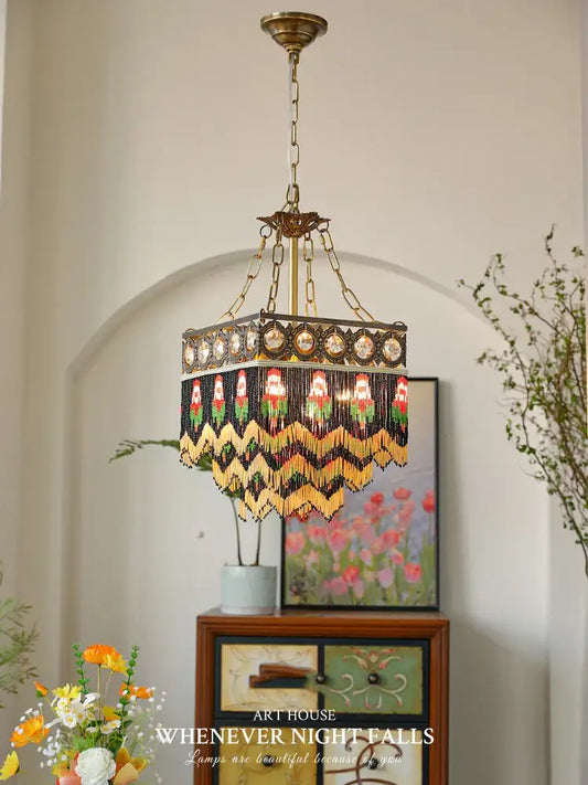 Antique french brass crystal chandelier with intricate beaded fringe and colorful floral glass panels for dining room decorbites french brass