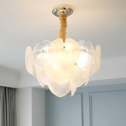 A decorbites french cream crystal living room chandelier with white petal glass shades and wooden-textured rod