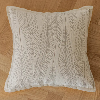 Beige pillow covers with embroidered gray fern patterns in french cream jacquard for decorbites living room decor