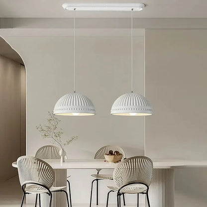 Two white ribbed pendant lights with beaded detailing in decorbites french cream style led chandelier for dining room