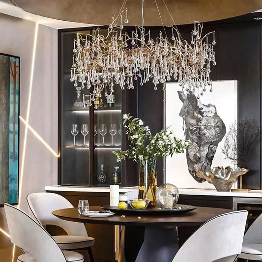 A french crystal chandelier with golden metal frame and cascading crystals for elegant dining room decorbites french crystal lighting