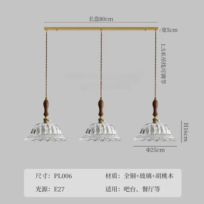 Three-light pendant lights with brass frame wooden finials and faceted glass shades decorbites french ins walnut
